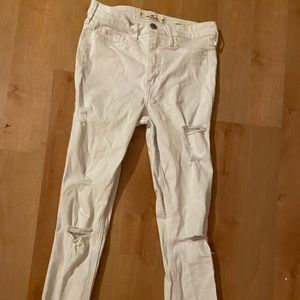 AE high rise white super skinny stretch size 3R, W26, L30 jean.